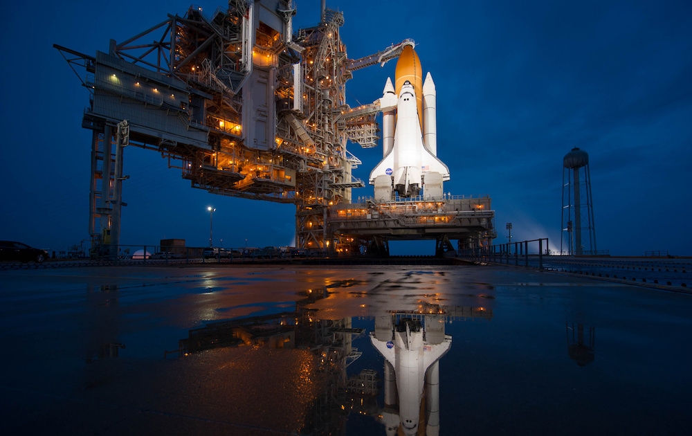 The space shuttle Atlantis is seen shortly after the rotating service structure (RSS) was rolled back at launch pad 39a, Thursday, July 7, 2011 at the NASA Kennedy Space Center in Cape Canaveral, Fla. Atlantis is set to liftoff Friday, July 8, on the final flight of the shuttle program, STS-135, a 12-day mission to the International Space Station. Photo Credit: (NASA/Bill Ingalls)